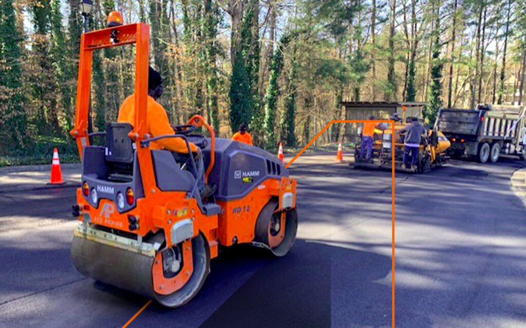 Ace Paving worker driving machinery